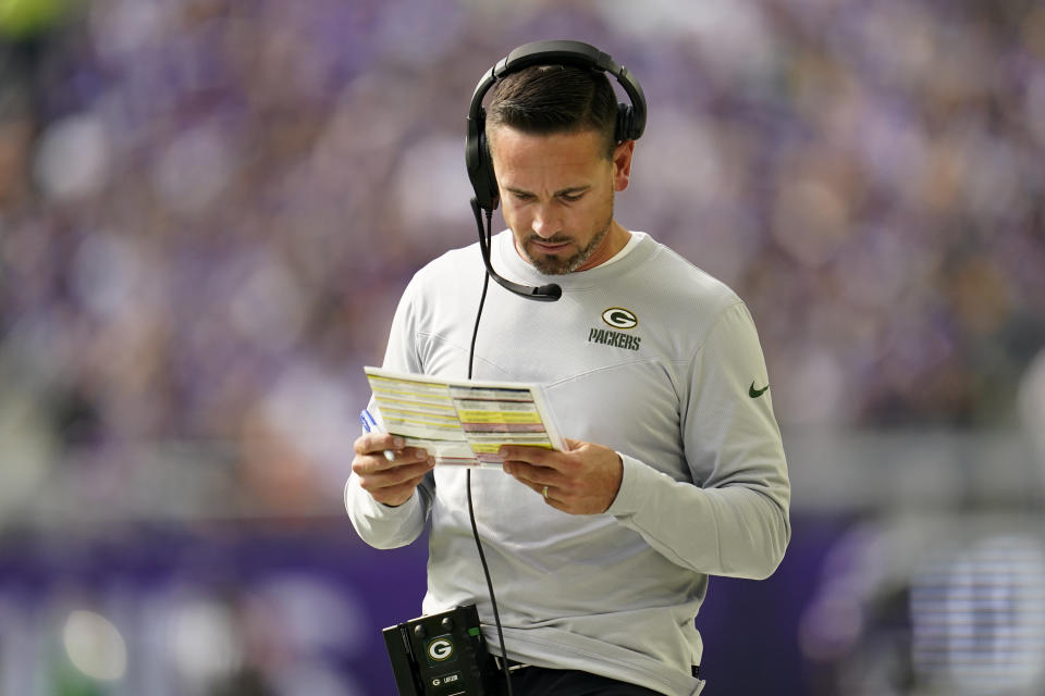 Green Bay Packers head coach Matt LaFleur stands on the sideline during the first half of an NFL football game against the Minnesota Vikings, Sunday, Sept. 11, 2022, in Minneapolis. (AP Photo/Abbie Parr)