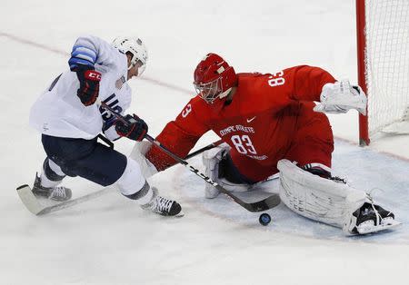 Ice Hockey - Pyeongchang 2018 Winter Olympics - Men's Preliminary Round Match - Olympic Athletes from Russia v U.S. - Gangneung Hockey Centre, Gangneung, South Korea - February 17, 2018 - Broc Little of U.S. in action with Olympic Athlete from Russia goalie Vasili Koshechkin. REUTERS/Brian Snyder