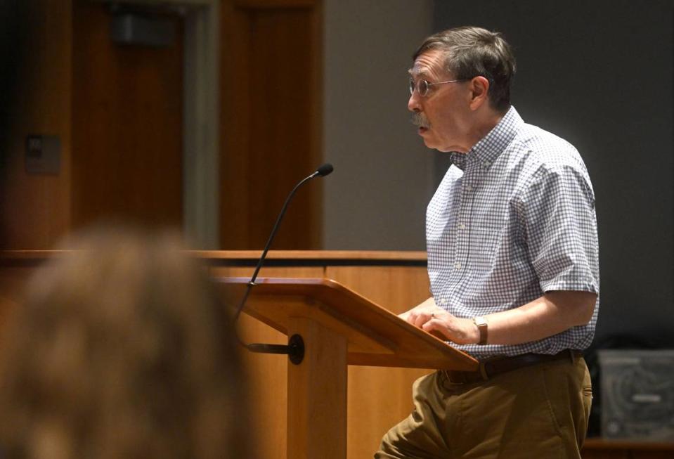 State College resident Evan Myers talks Monday about the antisemitic messages that were found in he and his neighbors’ front yards during the State College Borough Council meeting.