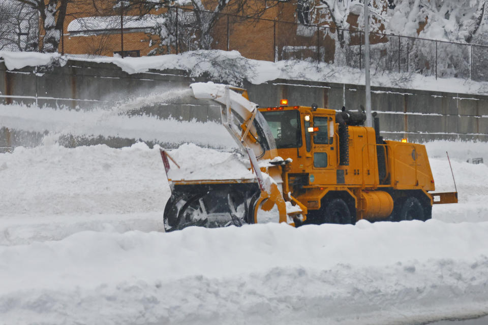 A snow removal truck clears snow off route 33 after a winter storm rolled through Western New York Tuesday, Dec. 27, 2022, in Buffalo, N.Y. (AP Photo/Jeffrey T. Barnes)