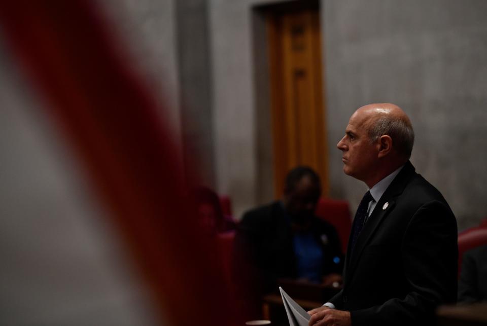 Rep. Gino Bulso, R- Brentwood, walks up in the House to argue in favor of his bill that would ban pride flags from Tennessee public schools, at the state Capitol in Nashville , Tenn., Monday, Feb. 26, 2024.