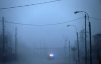 <p>A lone police car on patrol during the passing of Hurricane Irma on September 6, 2017 in Fajardo, Puerto Rico. (Photo: Jose Jimenez/Getty Images) </p>