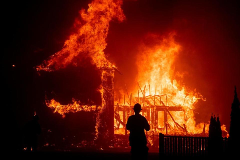 The Camp Fire rages through Paradise on November 8 (AP)