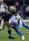 <p>New Orleans Saints defensive end Cameron Jordan (94) forces Detroit Lions running back Theo Riddick (25) to to lose the football on a pass play, resulting in an interception in the second half of an NFL football game in New Orleans, Sunday, Oct. 15, 2017. (AP Photo/Bill Feig) </p>