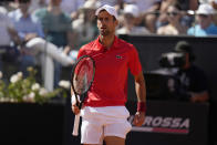 Serbia's Novak Djokovic reacts during a match against Chile's Alejandro Tabilo at the Italian Open tennis tournament in Rome, Sunday, May 12, 2024. (AP Photo/Alessandra Tarantino)