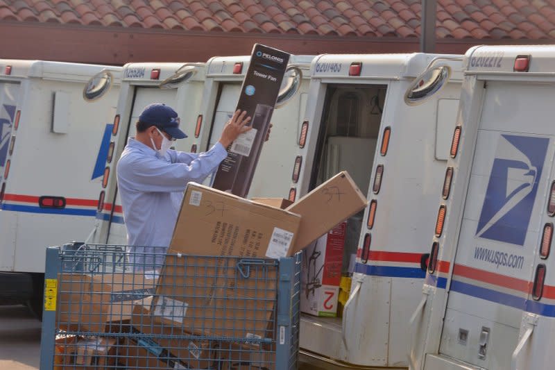 Under a U.S. Postal Service proposal announced Friday, the cost of mailing letters, postcards and more could rise next year. Photo by Jim Ruymen/UPI
