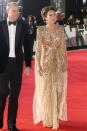 <p> Pictured here at the 2021 <em>No Time To Die</em>, James Bond premiere in London Princess Kate looked absolutely mesmerising in a floor-length golden sequined gown. The dress with its structured shoulders and flowing cape element stole the show at the star-studded event and this is definitely one look we won’t forget any time soon.  </p>