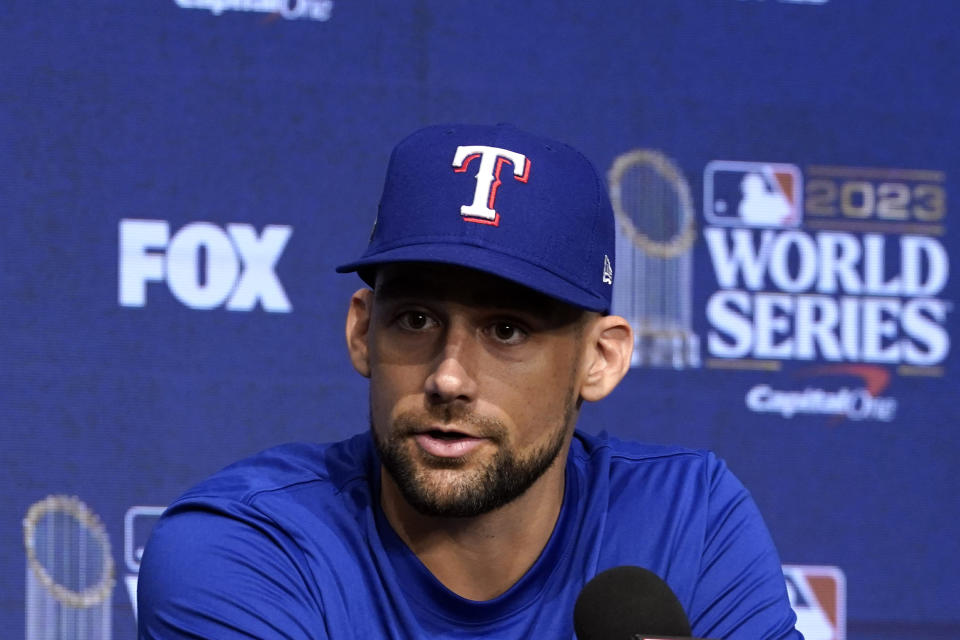 Texas Rangers starting pitcher Nathan Eovaldi answers a question during a World Series baseball media day Thursday, Oct. 26, 2023, in Arlington, Texas. The Rangers will play the Arizona Diamondbacks in Game 1 of the World Series tomorrow. (AP Photo/Tony Gutierrez)