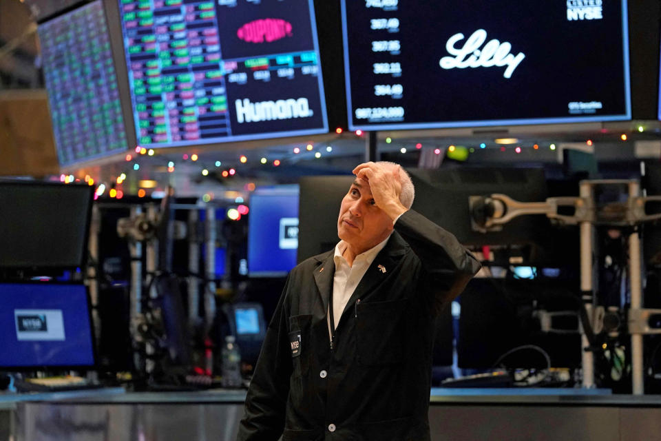 A trader reacts on the floor of the New York Stock Exchange at the closing bell on Dec. 30, 2022 in New York.  (Timothy A. Clary / AFP - Getty Images)