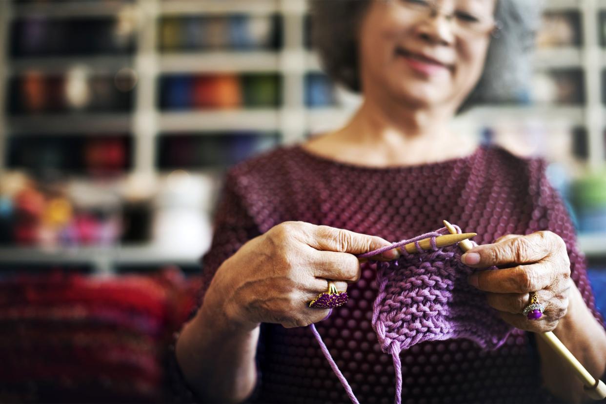 Senior woman knitting