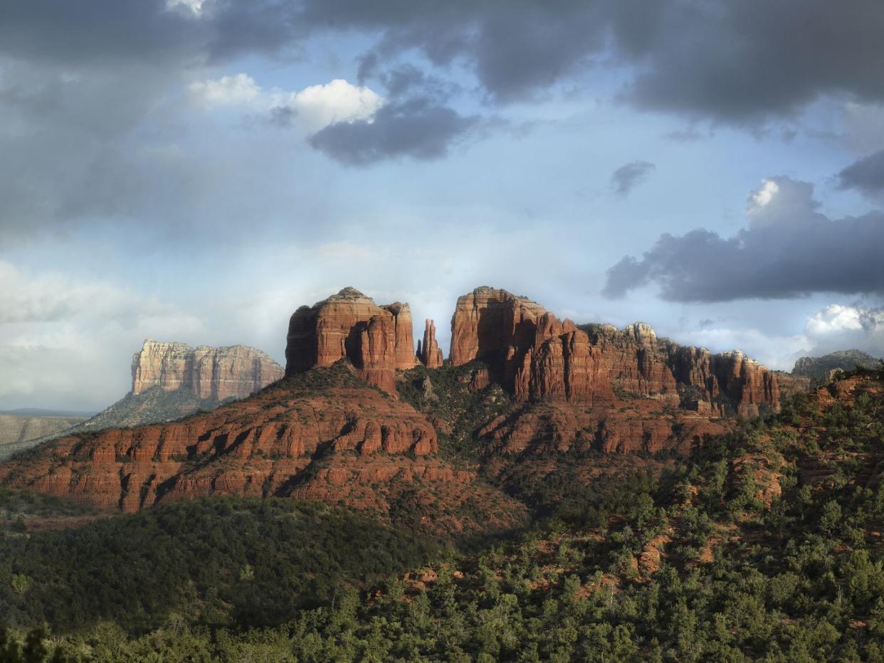 usa, arizona, sedona, rock formation at dusk