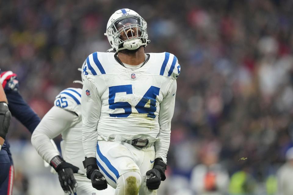 Indianapolis Colts defensive end Dayo Odeyingbo (54) celebrates a defensive stop in the first half of an NFL football game against the New England Patriots in Frankfurt, Germany Sunday, Nov. 12, 2023. (AP Photo/Michael Probst)