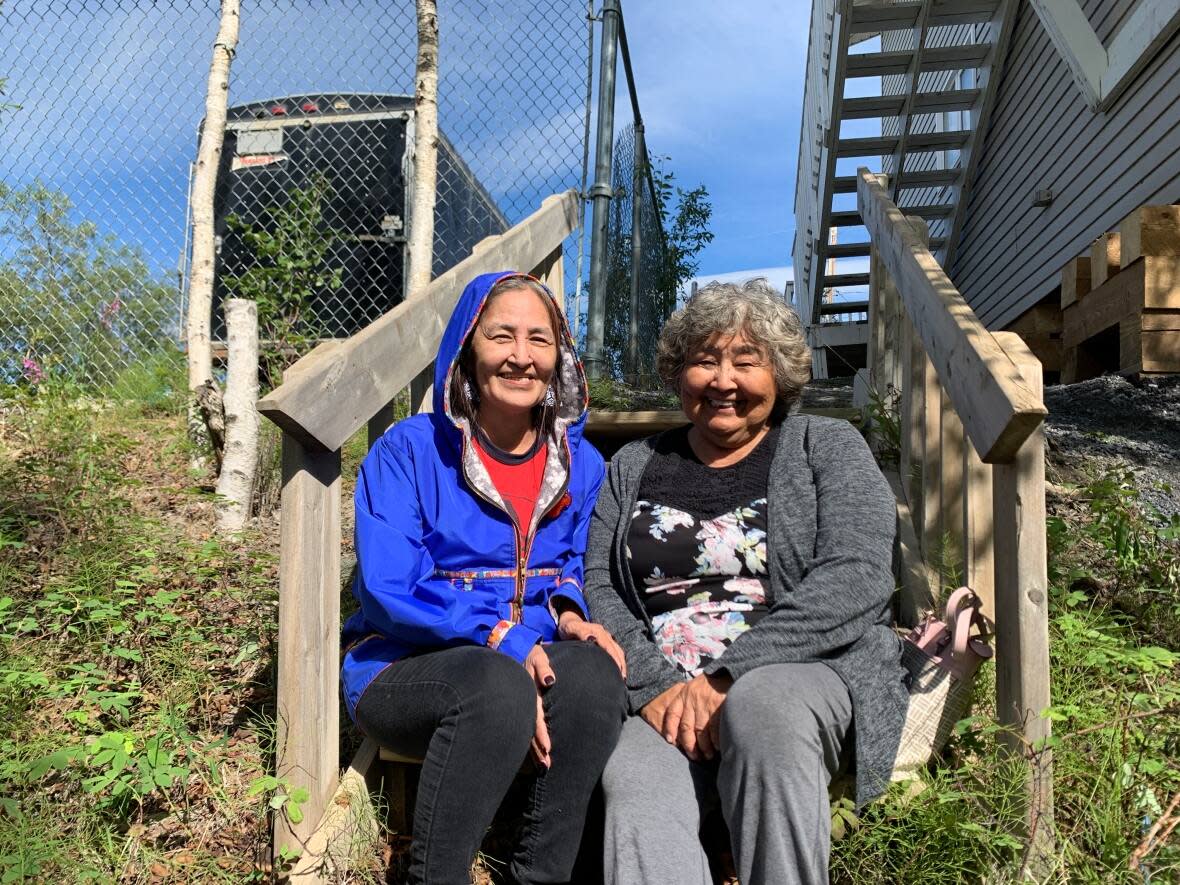 Peggy Day, left, and Susan Peffer have helped establish Hope House, a support hub for people experiencing homelessness, which is expected to open in Inuvik this fall. (Tyanna Bain/CBC - image credit)