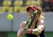 2016 Rio Olympics - Tennis - Preliminary - Women's Singles Second Round - Olympic Tennis Centre - Rio de Janeiro, Brazil - 08/08/2016. Eugenie Bouchard (CAN) of Canada in action against Angelique Kerber (GER) of Germany REUTERS/Toby Melville