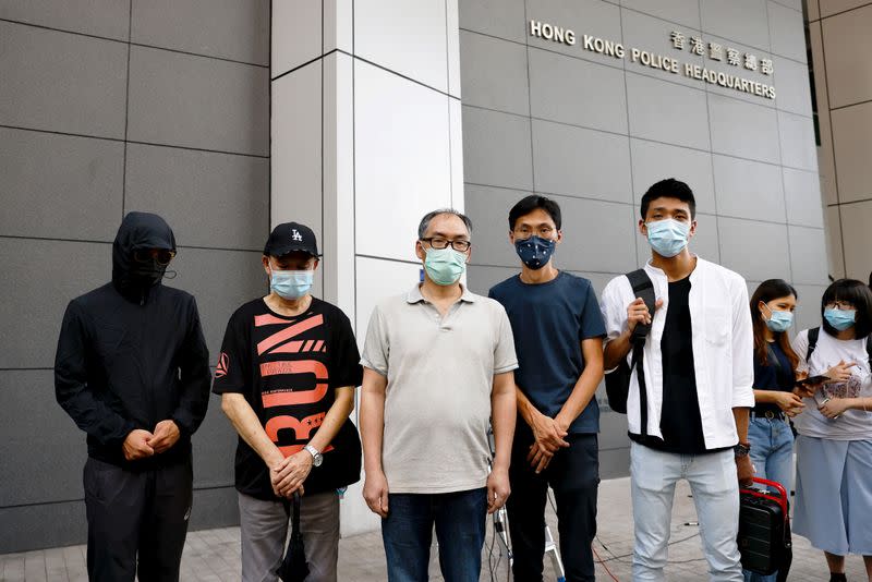 Relatives of 12 activists detained at sea report to the police to seek help in Hong Kong