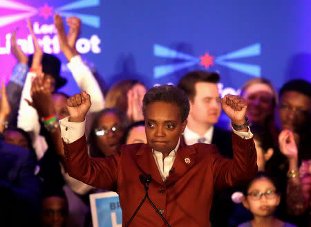 Mayoral candidate Lori Lightfoot clinches her fists as she speaks during her election night celebration after defeating her challenger Toni Preckwinkle in a runoff election in Chicago, Illinois, U.S., April 2, 2019. REUTERS/Joshua Lott