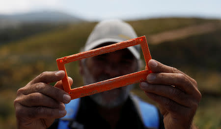 Miguel Lacerda, 62, shows part of an equipment used in lobster fishing in the United States at the coast near Sintra, Portugal May 22, 2019. REUTERS/Rafael Marchante