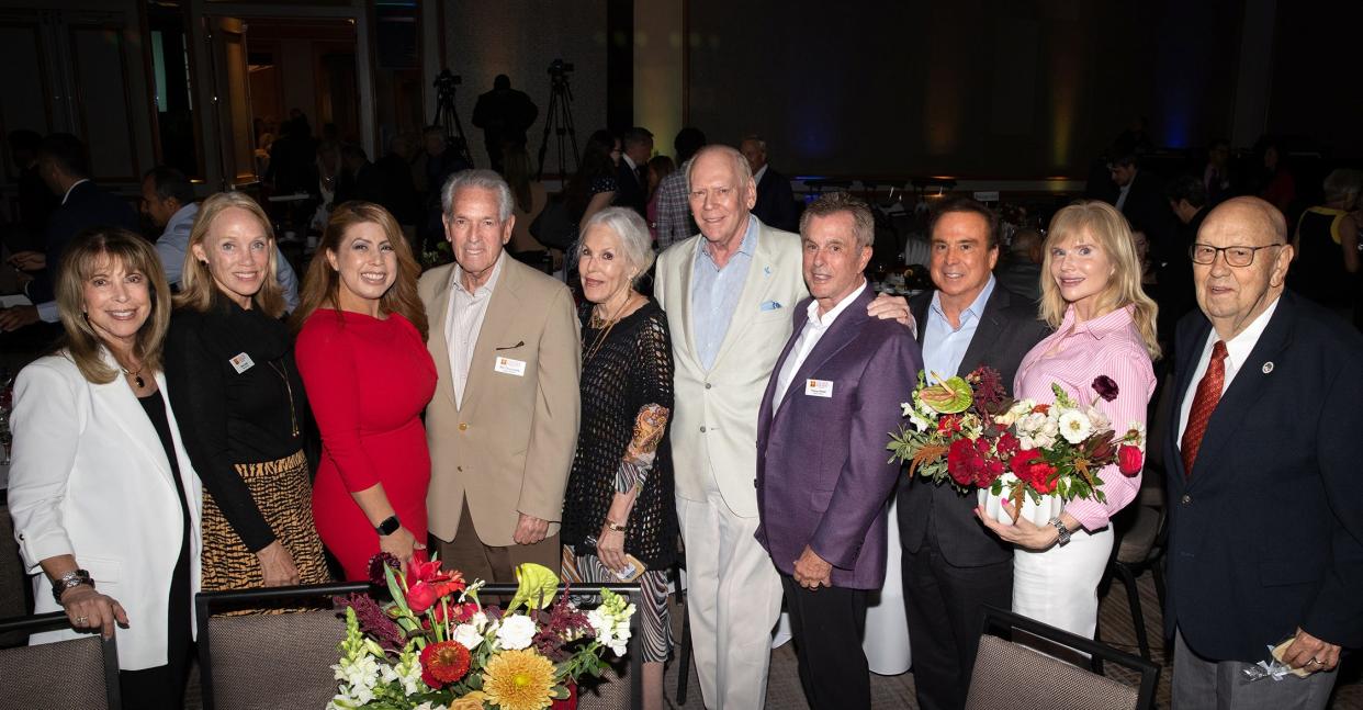 Joanne Chunowitz, Diane Rubin, Martha Garcia, Bill Chunowitz, Carol Fragen, Bob Archer, Tom Minder, Jim and Jessica Greene and William Kroonen pose at College of the Desert's Oct. 26, 2022, State of the College event.