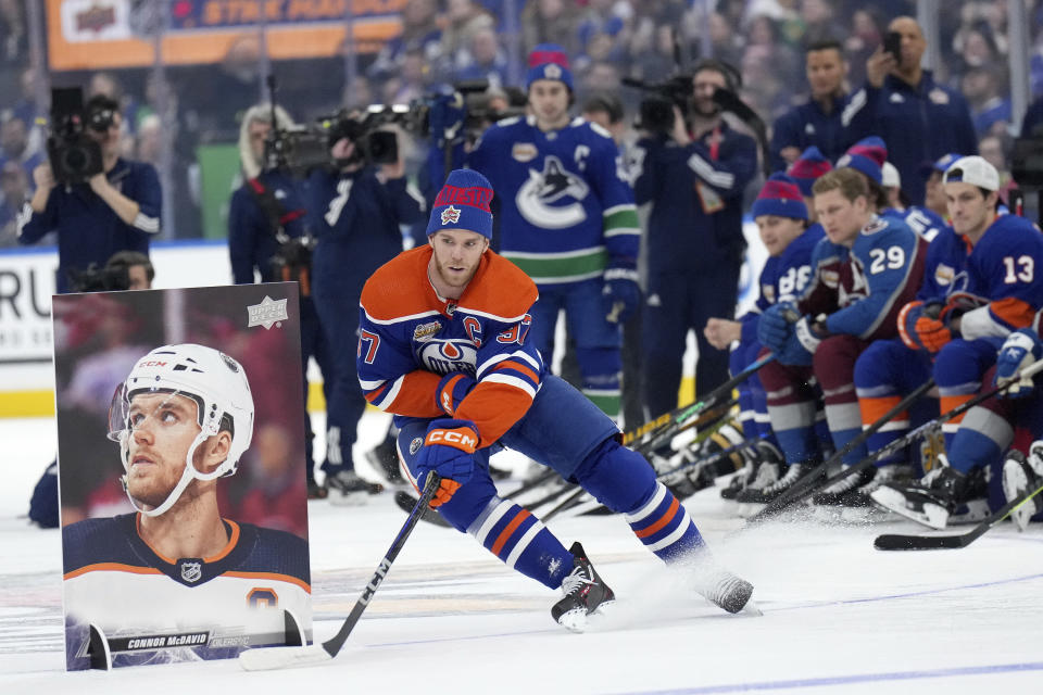 Edmonton Oilers' Connor McDavid navigates the course during the NHL All-Star hockey skills competition's stick handling section, in Toronto, Friday, Feb. 2, 2024. (Nathan Denette/The Canadian Press via AP)