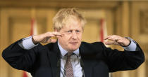 Prime Minister Boris Johnson gives a press conference about the ongoing situation with the COVID-19 coronavirus pandemic at 10 Downing Street in London, Monday March 16, 2020. According to the World Health Organization, the vast majority of people recover from the new COVID-19 coronavirus in about two to six weeks depending on the severity of the illness. (Richard Pohle/Pool via AP)