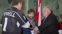 Toronto Mayor Rob Ford, right, handed out material from his 2010 election campaign to movie stars Will Ferrell and Zach Galifianakis.