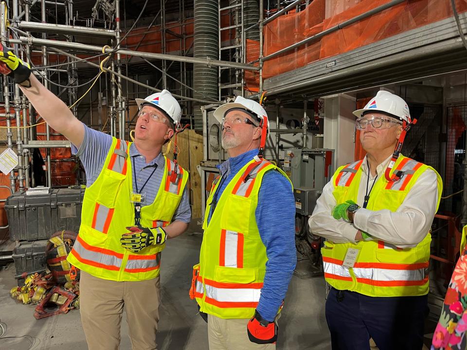 Rep. Rick Allen, R-Augusta, right, with Rep. Jeff Duncan of South Carolina, center, tour Plant Vogtle on April 24.