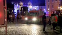 An ambulance leaves as people vacate the square following an explosion in Ansbach, near Nuremberg July 25, 2016, in this still image taken from video. Courtesy News5/via Reuters TV