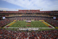 FILE - FedEx Field, home of the Washington Commanders NFL football team, is shown before the start of a football game between the Philadelphia Eagles and Washington Commanders, Sunday, Sept. 25, 2022, in Landover, Md. A group led by Josh Harris and Mitchell Rales that includes Magic Johnson has an agreement in principle to buy the NFL's Washington Commanders from longtime owner Dan Snyder for a North American professional sports team record $6 billion, according to a person with knowledge of the situation. The person spoke to The Associated Press on condition of anonymity Thursday, April 13, 2023, because the deal had not been announced. (AP Photo/Nick Wass, File)