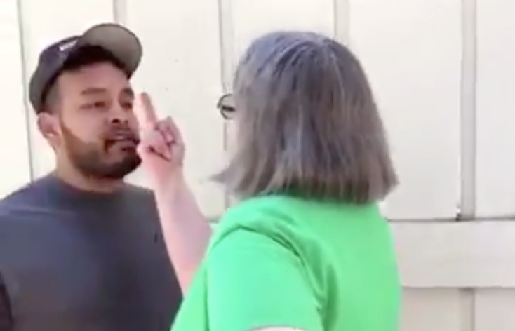 Esteban Guzman tries to calmly defend himself and his mother while the California woman goes on a racist tirade. (Photo: @KenidraRWoods_ via Twitter)