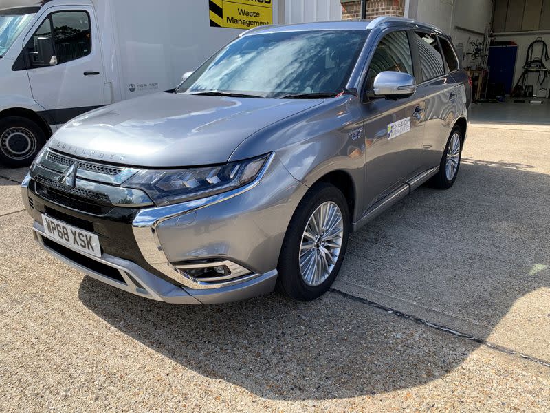 A Mitsubishi Outlander plug-in hybrid is pictured while undergoing tests by Emissions Analytics for a study on emissions by NGO Transport & Environment