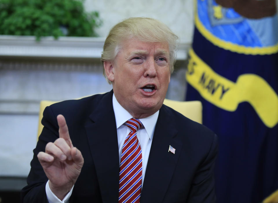 President Donald Trump speaks in the Oval Office of the White House, Wednesday, Feb. 14, 2018. (AP Photo/Manuel Balce Ceneta)