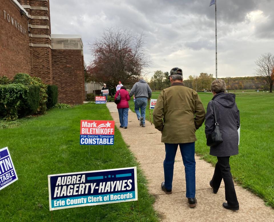 Voters walk into the Greene Township Building, 933 Tate Road, to vote Tuesday, Nov. 2, 2021, during the 2021 municipal general election.