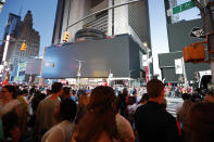 Screens in Times Square are black during a widespread power outage, Saturday, July 13, 2019, in the Manhattan borough of New York. Authorities say a transformer fire caused a power outage in Manhattan and left businesses without electricity, elevators stuck and subway cars stalled. (AP Photo/Michael Owens)