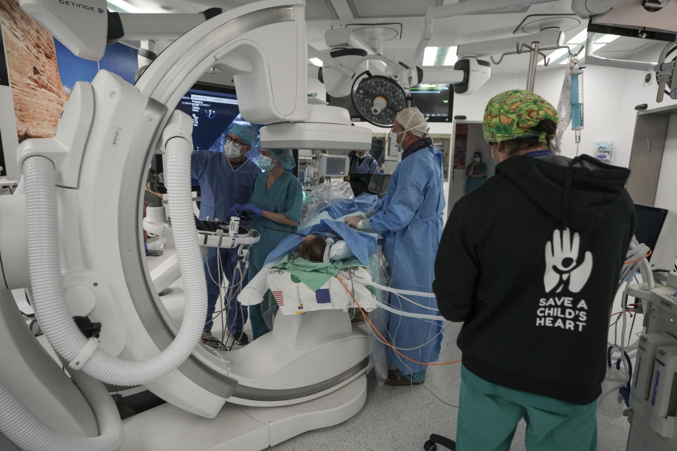 Karina Andreiko, a 5-year-old Ukrainian girl, undergoes heart surgery by a team led by Dr. Sagi Assa, head of invasive pediatric cardiology, from the Save A Child's Heart non-profit organization, at the Wolfson Medical center in Holon, near Tel Aviv, Israel, Monday, May 2, 2022. Andreiko, received treatment in Israel for a heart defect that she would not have in her war-ravaged home country. (AP Photo/Ariel Schalit)