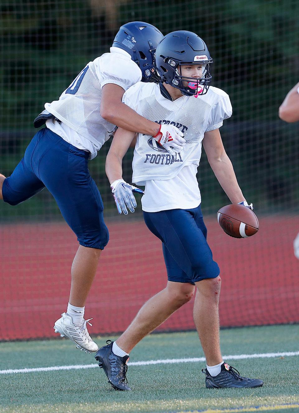 Pembroke Titan receiver Will McNamara scores a touchdown in a preseason football scrimmage at Norwell on Friday, Sept. 2, 2022.