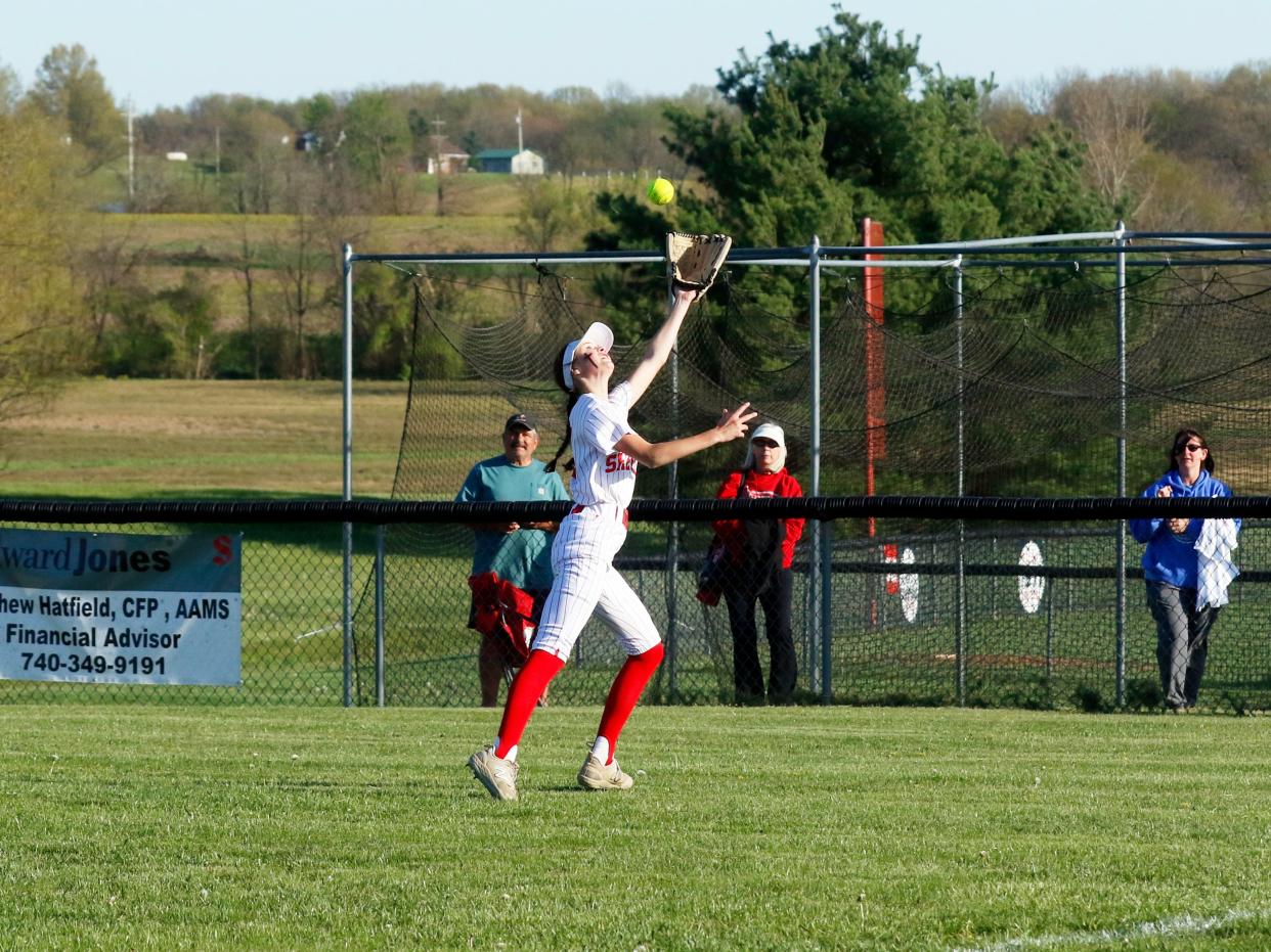 Hayley Clifton makes a running catch in right field to rob extra bases and secure Sheridan's 5-2 win against visiting Tri-Valley on Monday in Thornville.