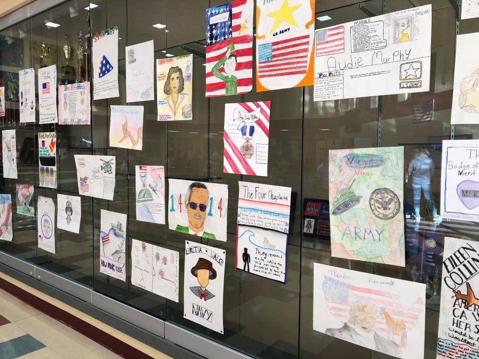 Licking Heights Middle School students honored veterans by creating posters, which were displayed during the school's Veterans Day program Nov. 10.