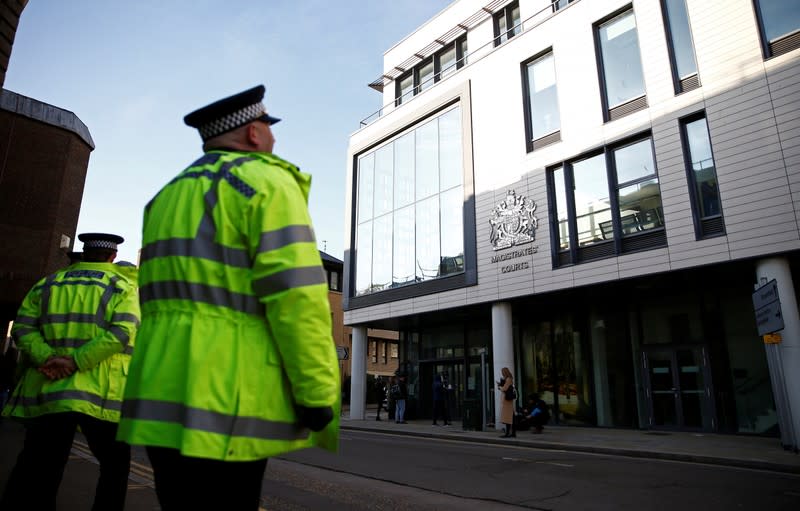 Police officers are seen outside Chelmsford Magistrates' Court