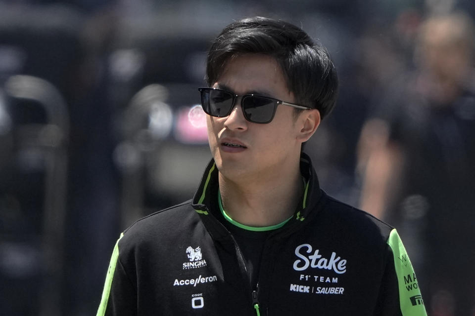 Sauber driver Zhou Guanyu of China walks on the paddock area ahead of the Chinese Formula One Grand Prix at the Shanghai International Circuit in Shanghai, China, Thursday, April 18, 2024. (AP Photo/Andy Wong)