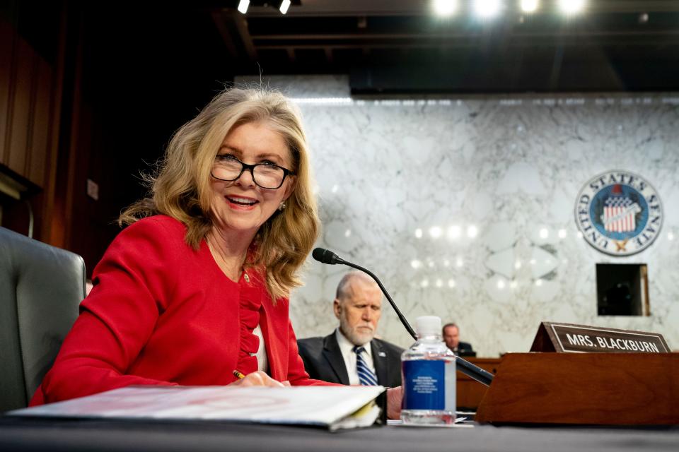 Sen. Thom Tillis, R-N.C., center, listens as Sen. Marsha Blackburn, R-Tenn., left, speaks during a Senate Judiciary Committee hearing to examine promoting competition and protecting consumers in live entertainment on Capitol Hill in Washington, Tuesday, Jan. 24, 2023. (AP Photo/Andrew Harnik)