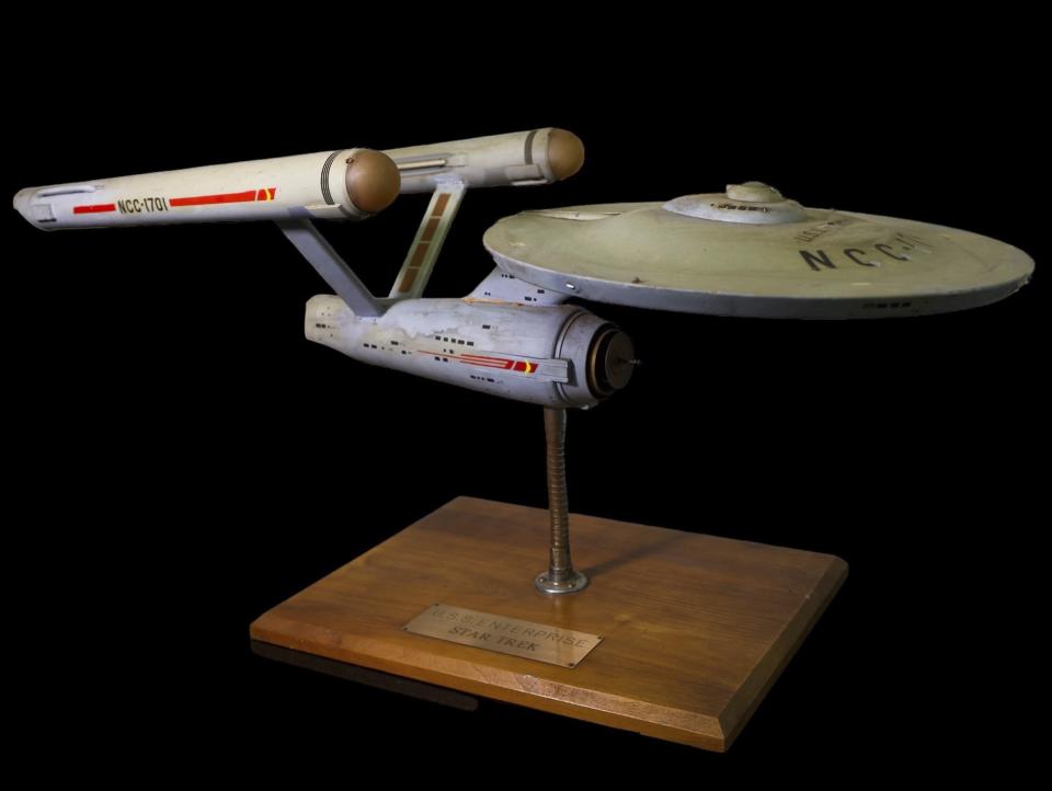 The first model of the USS Enterprise is displayed at Heritage Auctions in Los Angeles, April 13, 2024. The model — used in the original “Star Trek” television series — has been returned to Eugene “Rod” Roddenberry, the son of “Star Trek” creator Gene Roddenberry, decades after it went missing in the 1970s. (Josh David Jordan/Heritage Auctions via AP)