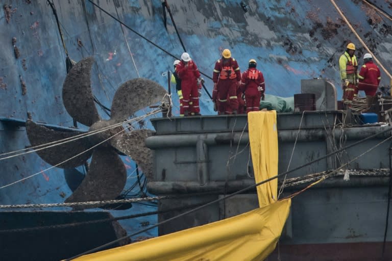 About 450 workers are involved in the elaborate operation to lift the Sewol