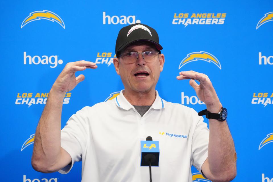 Jim Harbaugh speaks at press conference during the first day of offseason workouts for the Los Angeles Chargers at Hoag Performance Center.