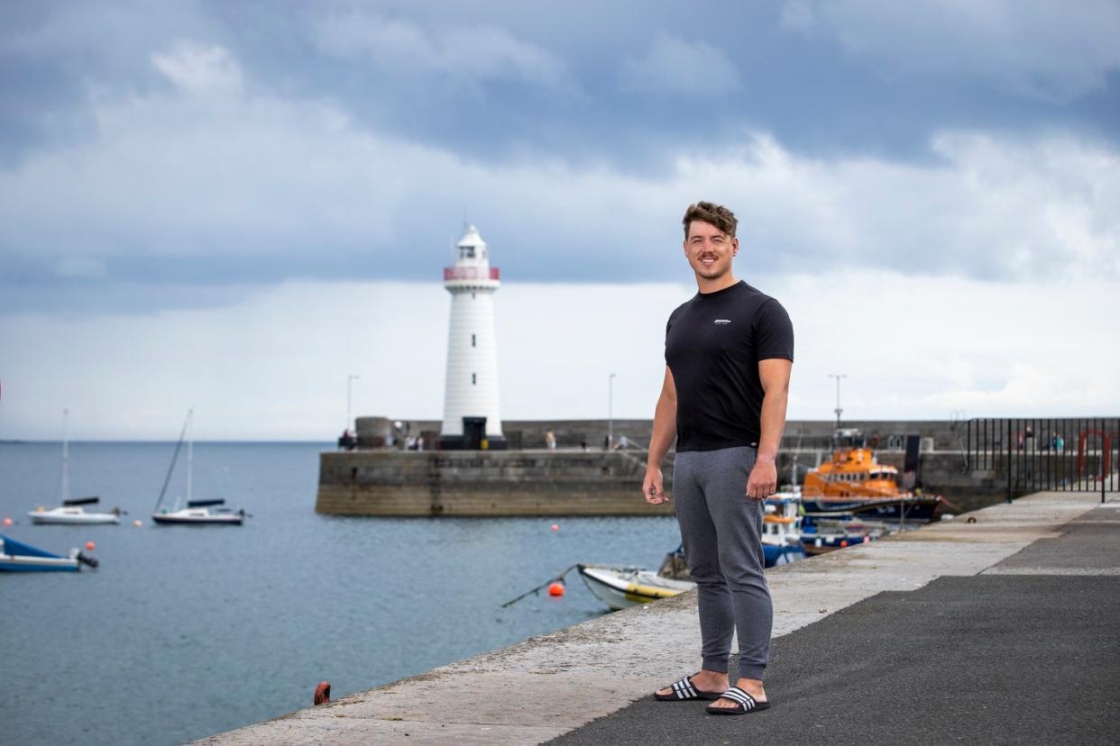 Jordan Leckey at Donaghadee Harbour in Northern Ireland, close to where he set off swimming to Portpatrick in Scotland (Liam McBurney/PA)