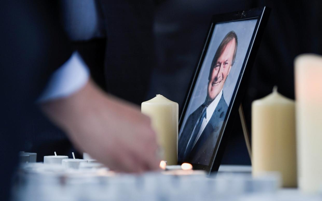 Candles are lit for Sir David Amess in Southend-on-Sea - Tony O'Brien/Reuters