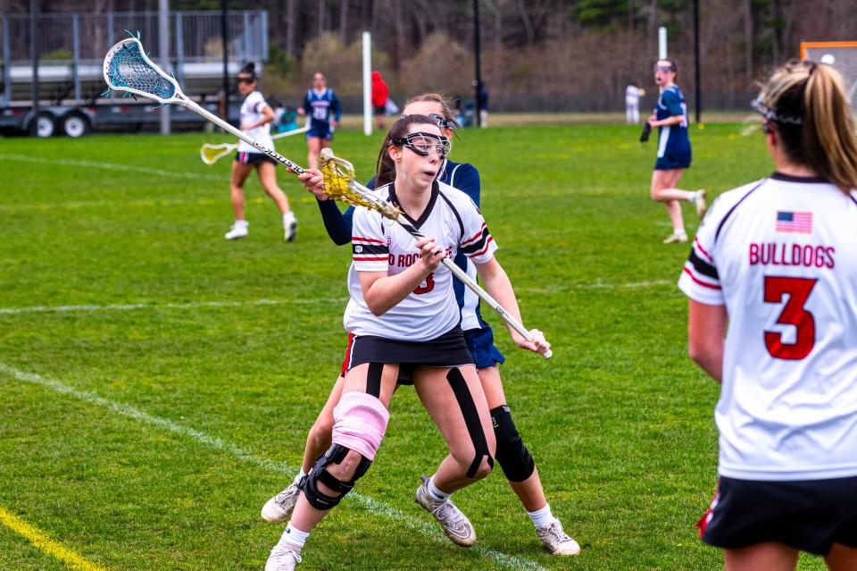 Old Rochester's Kelly Quinlan spins around the Laker defender to start the counter attack.