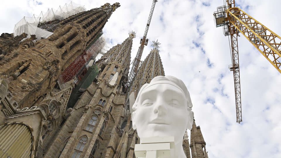 Photo of construction at Sagrada Famalia on September 19, 2023, shows a pinnacle depicting a human figure that will be set at 135 meters (443 feet) high. - Pau Barrena/AFP/Getty Images