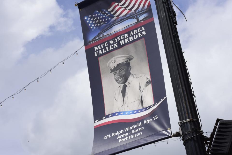 The Blue Water Area Fallen Heroes banners hang in downtown Port Huron on Thursday, May 26, 2022. The program aims to put a photo of every service member from St. Clair County who died while in service since World War I.
