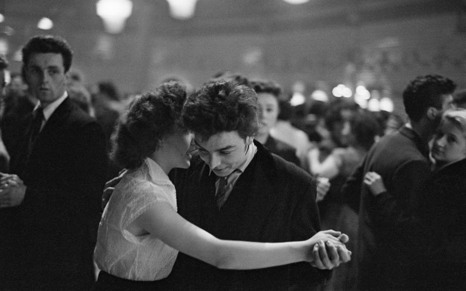 A 'Teddy Boy' dances with his girl at the Mecca Dance Hall in Tottenham, London