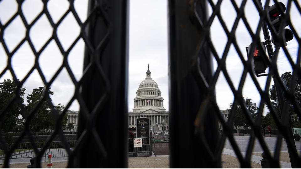 The U.S. Capitol stands behind security fencing on September 17, 2021 in Washington, DC. Security in the Washington, DC been increased in preparation for the Justice for J6 Rally, a rally happening this weekend in Washington for support for those who rioted at the U.S. Capitol on January 6 to protest the 2020 presidential election outcome. (Drew Angerer/Getty Images)